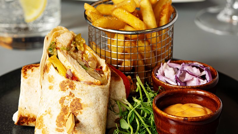 Chicken wrap with fries and dips