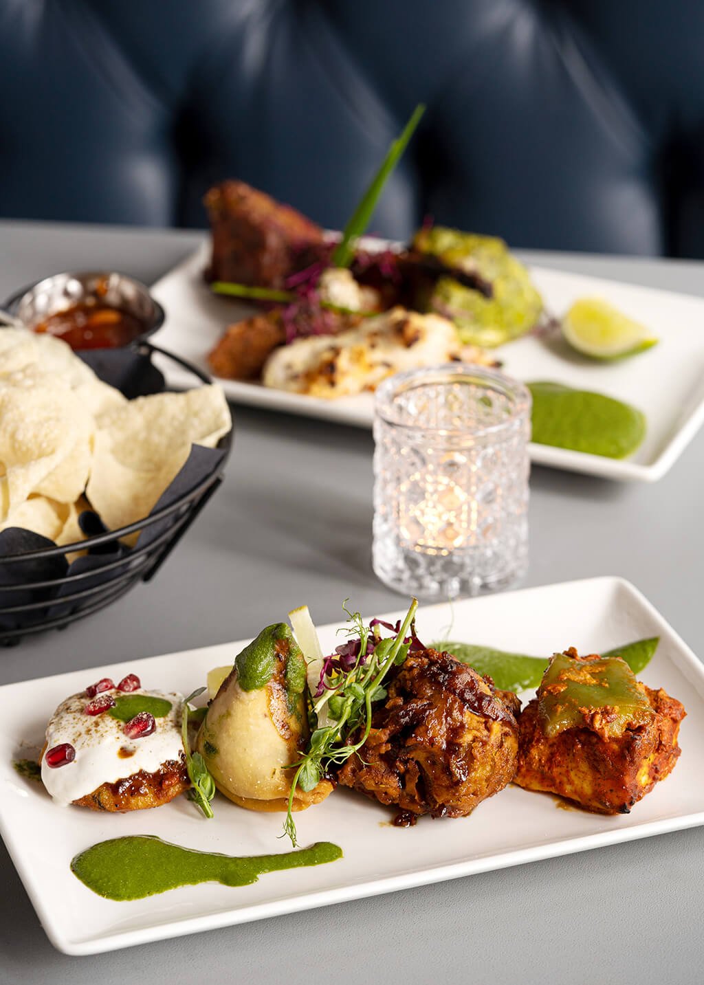 Plated tandoori starters with mint chutney